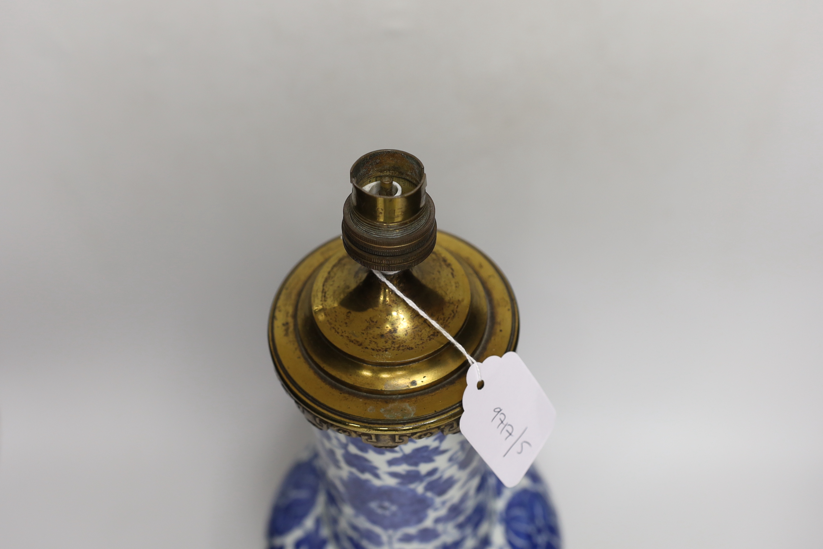 A 19th century Chinese blue and white ‘lotus’ vase, later converted into a brass lamp